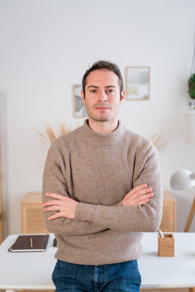 young-man-with-folded-arms-looking-at-camera-2023-02-11-02-20-16-utc.jpg